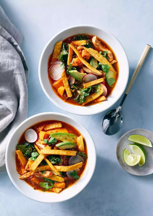 A savory Sweet Potato-and-Kale Tortilla Soup, perfect for cozy meals.