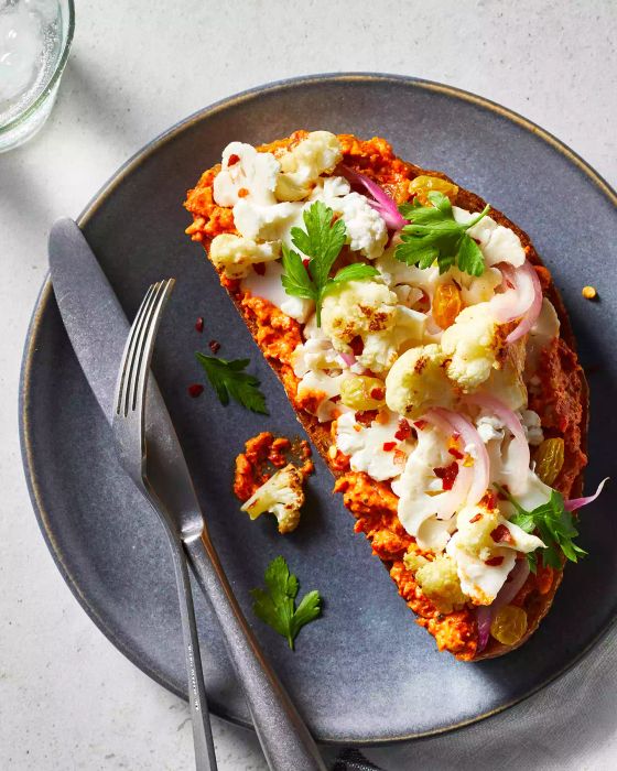 Roasted and Pickled Cauliflower Sandwiches with Romesco, a delicious open-faced treat.