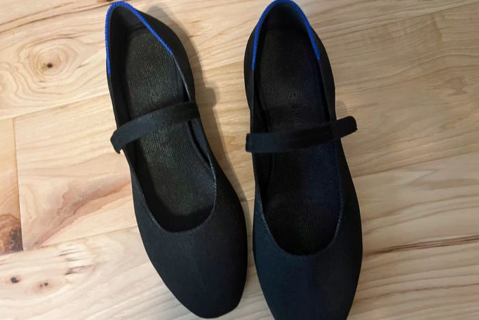A pair of Rothy's The Square Mary Janes on display