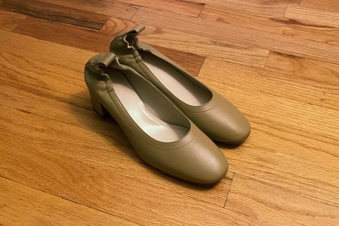 The Everlane Italian Leather Day Heels displayed on a wooden floor