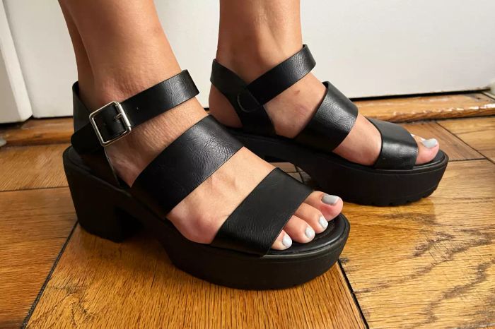 A model wearing the Soda Open Toe Block Heels