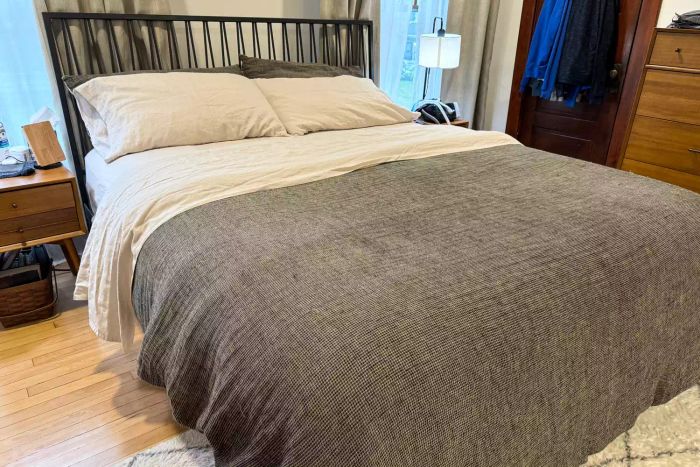 Rough Linen Smooth Linen Sheet Set arranged on a bed