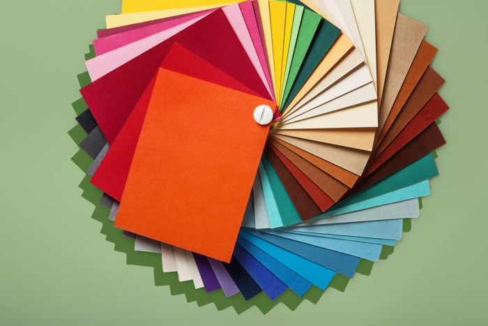 A still-life photograph featuring a color swatch book