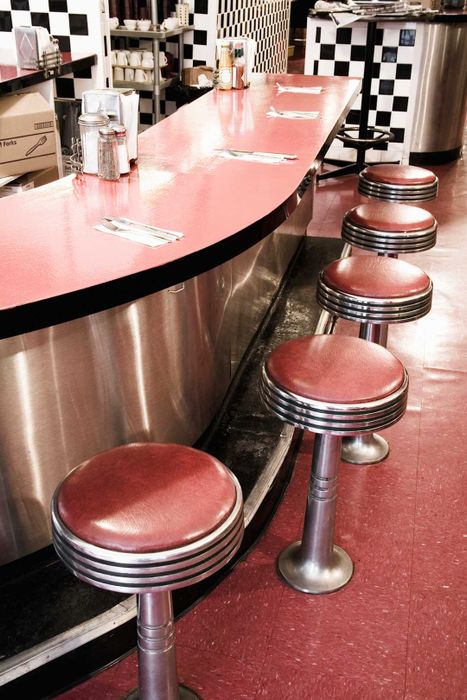 Elevated view of stools and counter in a diner
