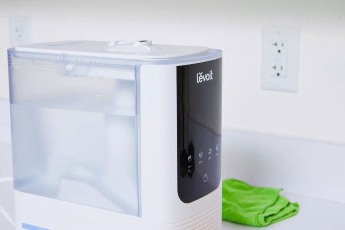 The Levoit OasisMist 450S Smart Humidifier is shown placed on a white counter