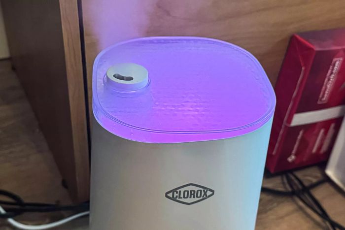 The top of the Clorox Ultra Clean Cool Mist Air Humidifier emits a purple glow