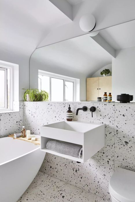Terrazzo tiled wall in bathroom