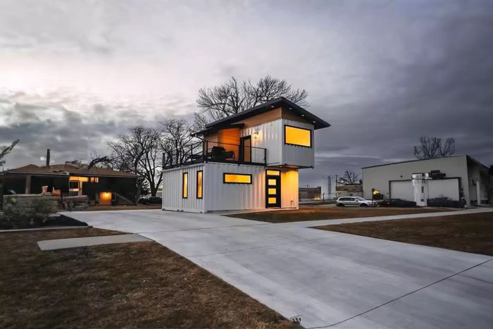 a tiny house situated on a street alongside other residences