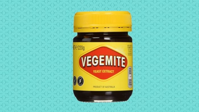 Spreading a bit of Vegemite on toast is a cherished custom in Australia.