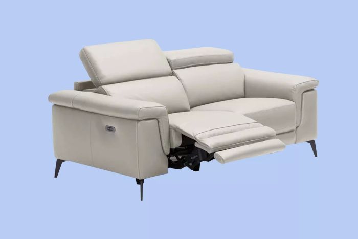 The Orren Ellis Philippa Leather Power Reclining Loveseat showcased on a blue backdrop