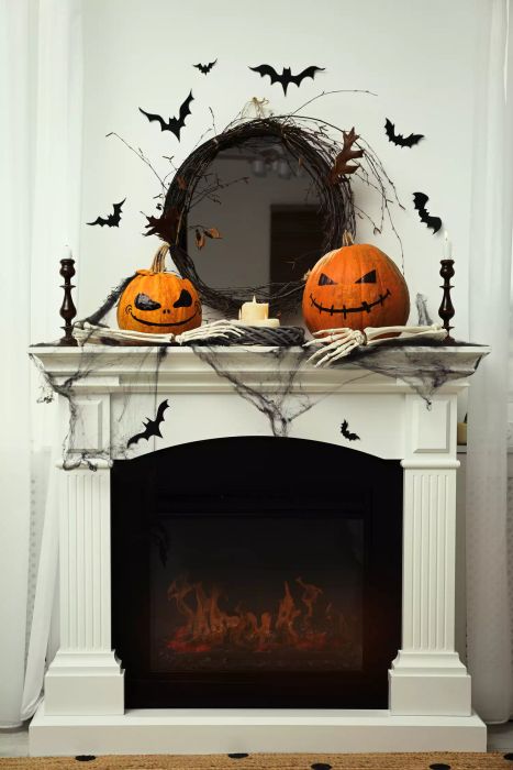 autumn mantel featuring pumpkins