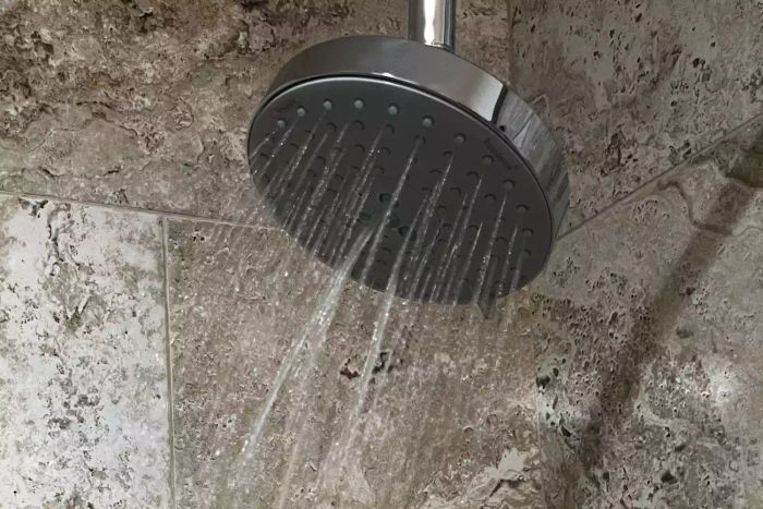 The Hansgrohe Raindance Showerhead with water flowing