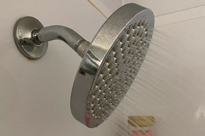 A close-up of the GURIN Shower Head High Pressure Rain in use