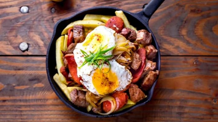A generous plate of chorrillana can easily stand on its own as a full meal.
