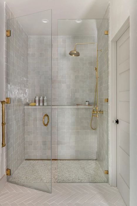 Shower featuring a built-in ledge