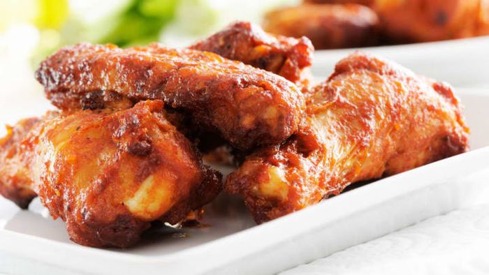 Chicken wings have become an expensive item on bar menus.