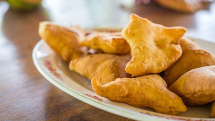 Mandazi takes on a triangular shape.