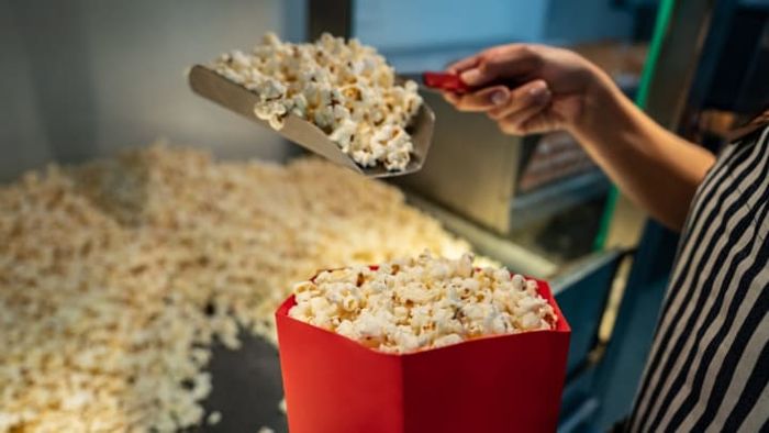 It’s the snacks, like popcorn, not the blockbuster films, that really keep theaters running.