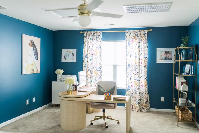 A home office painted with Salty Dog offers a deep, focused atmosphere that balances boldness with serenity.