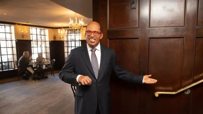 Al Roker offering a warm, encouraging smile to diners on the second floor.