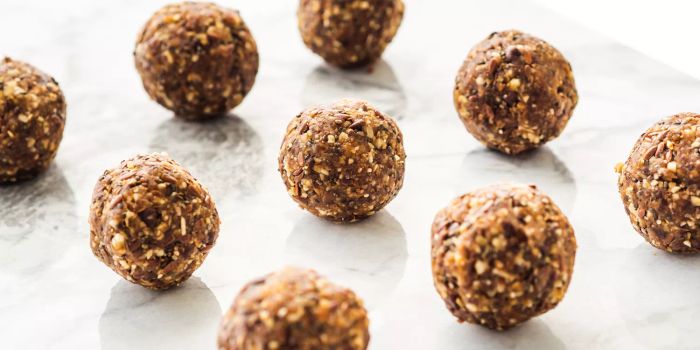 Energy-packed protein balls on a marble countertop