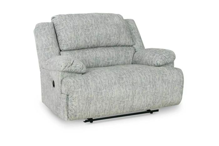The McClelland Oversized Manual Recliner is a plush, spacious seating option that offers comfort and support for a variety of lounging positions.