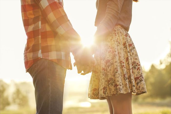 Couple holding hands