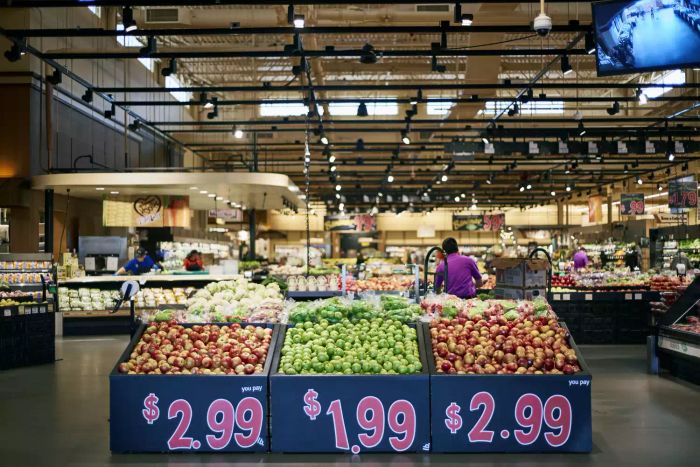 Apples and other produce displayed at Wegmans