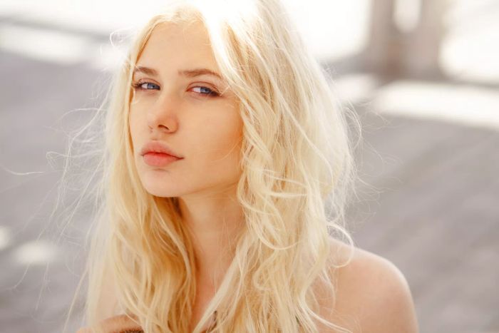 Long, blonde hair showcasing the Scandinavian hairline trend