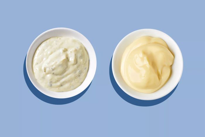 Aioli and mayonnaise placed in separate bowls