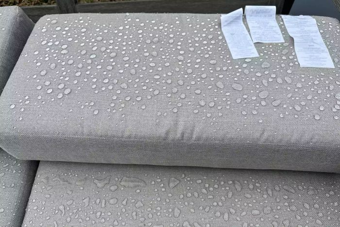 The West Elm Portside Outdoor 3-Piece Chaise Sectional cushions post-rain