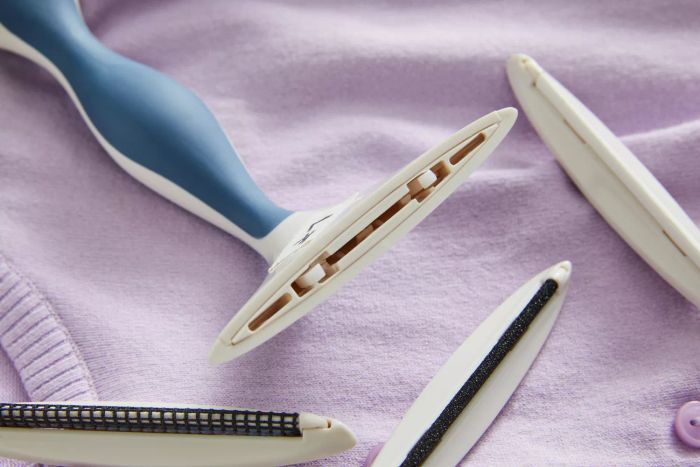 The Gleener Fabric Shaver & Lint Brush shown disassembled