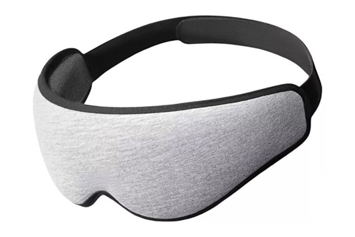 A plush pillow-style eye mask designed to provide a cozy, soothing sleep experience.