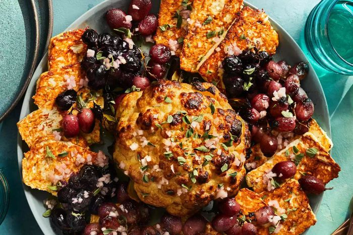vegetable-side-dishes-whole-roasted-cauliflower-grapes-feta-recipe-0221foo-dd563dbd383d45b89484f1cb94dd1790