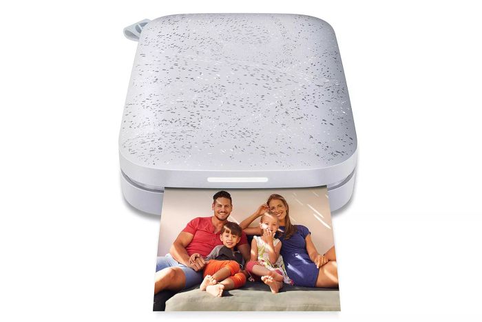 Capture memories instantly with the HP Sprocket Portable Photo Printer. This compact device lets you print photos from your phone, making it perfect for keeping your favorite moments close by.