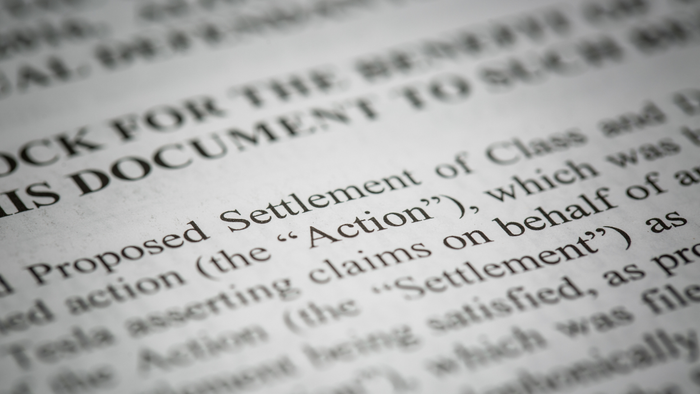 A close-up image of text from a class action settlement notice
