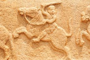An ancient stone depiction of a fighter