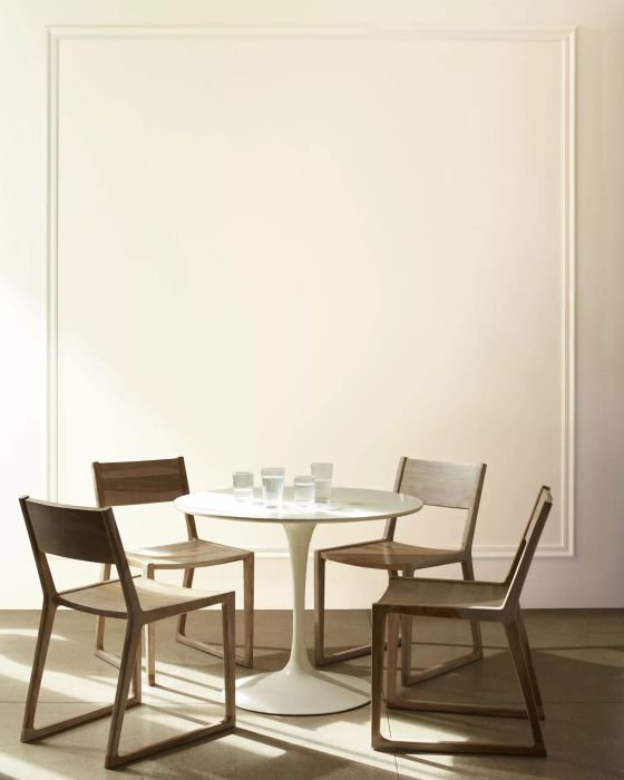 A wall painted in a linen white hue