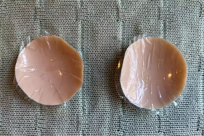 Gatherall Bra nipple covers placed on a blanket