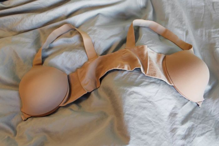 The Spanx Bra-llelujah! Lightly Lined Wireless Bra beautifully arranged on a bed.