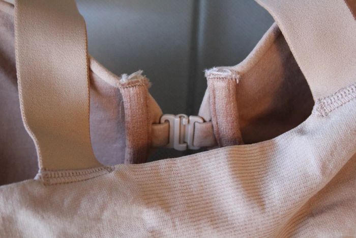 A close-up view of the front clasp on the Spanx Bra-llelujah! Lightly Lined Wireless Bra.