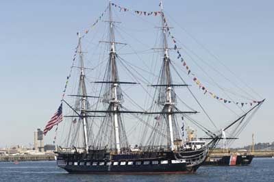 The USS Constitution, the oldest active warship in service, proudly sits in Boston Harbor.