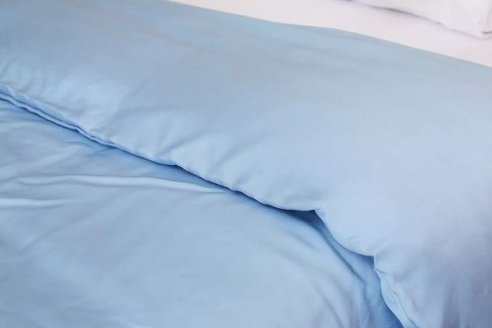 A detailed close-up view of the Sijo AiryWeight Eucalyptus Duvet Cover