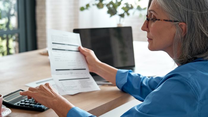 Woman calculating finances