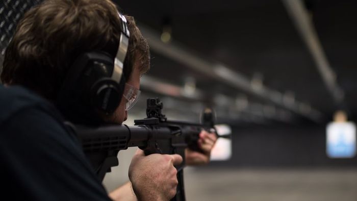 An individual testing a firearm