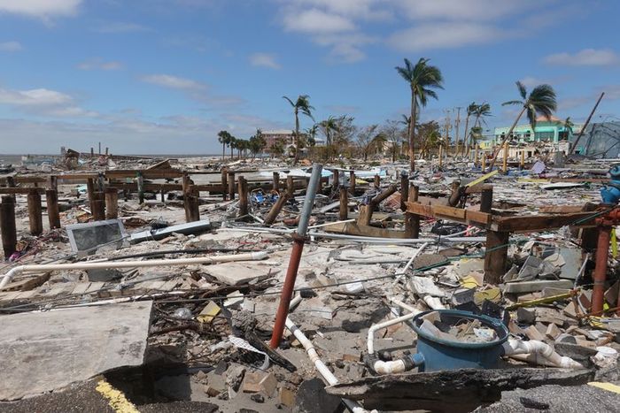 A photograph capturing the aftermath of a hurricane, showing the extensive damage left in its wake.