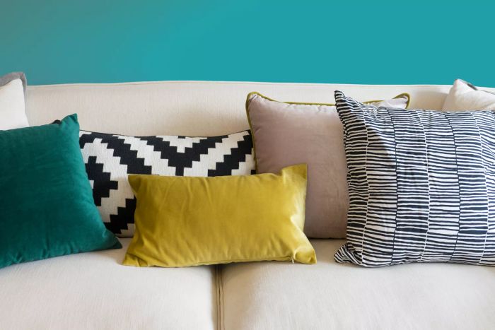 Brightly colored cushions on a sofa