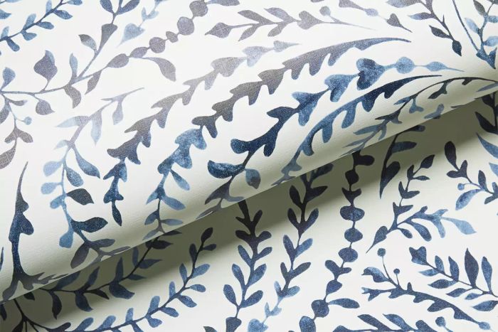 The Serena & Lily Priano Wallpaper offers a beautiful, watercolor-inspired botanical design that effortlessly enhances any space. It is a refined and soothing pattern with subtle, flowing vines, creating a peaceful ambiance.