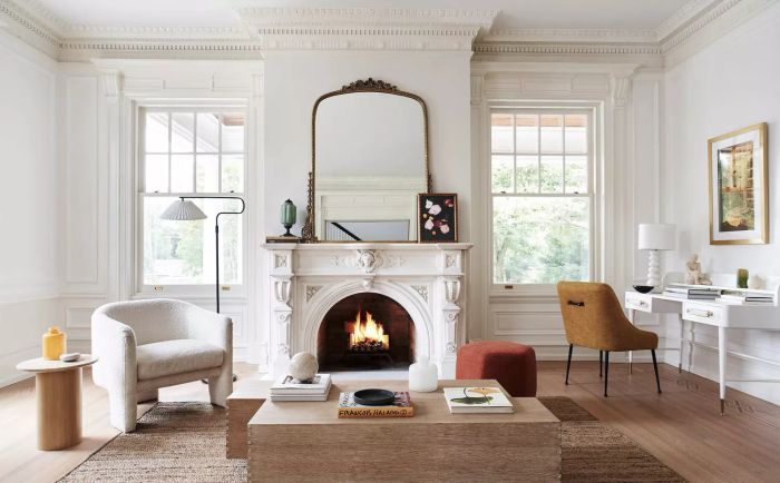Interior of white and neutral living room with crown molding