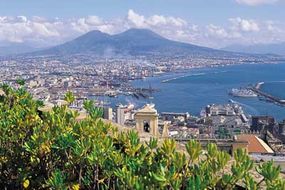 Scenic views of Naples, Italy, with Mount Vesuvius standing proudly in the background.